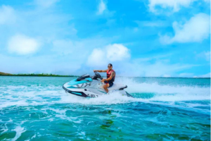 a man riding a jet ski in the water