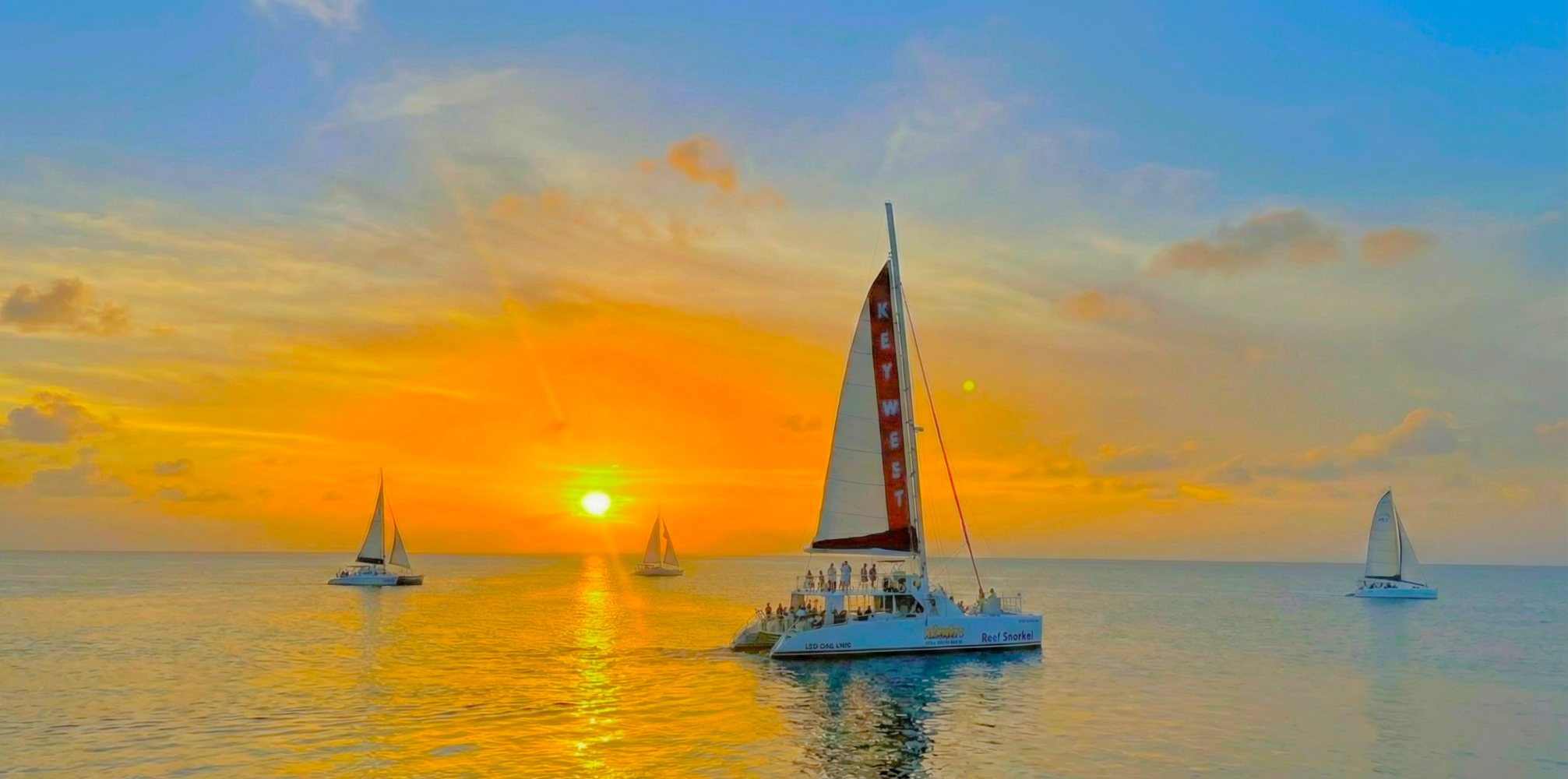 Sunset Watersports Key West Sandie Cat sailing at sunset