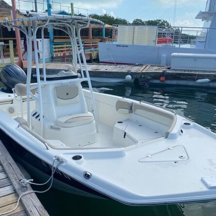 a boat docked at a dock