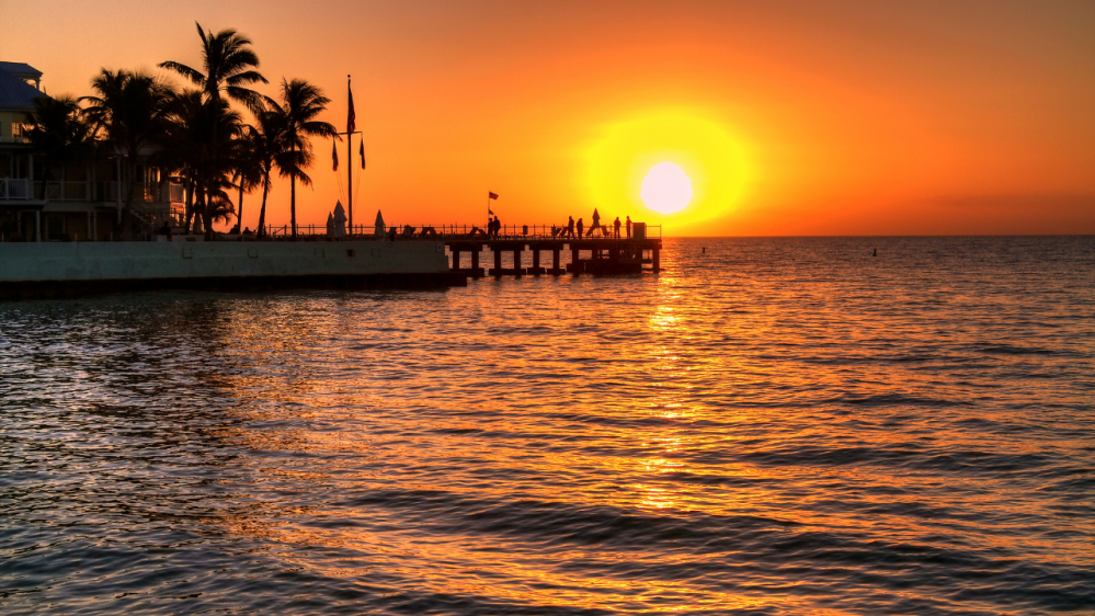 sunset at southernmost beach in key west florida