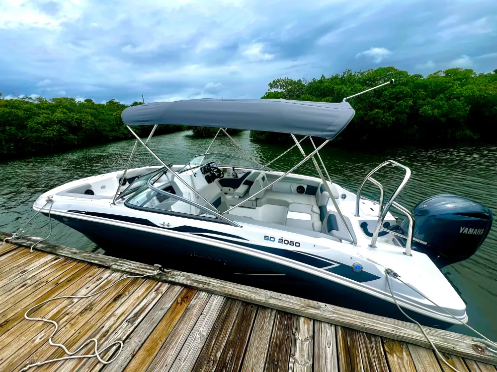 a plane sitting on top of a boat